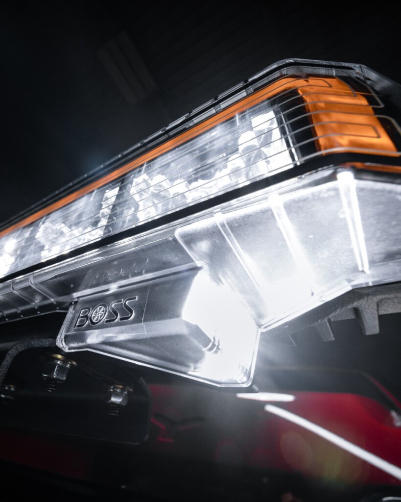 Close-up of BOSS SL4 LED Headlights illuminating a snow-covered road at night, showcasing their unmatched brightness and ClearBeam Technology