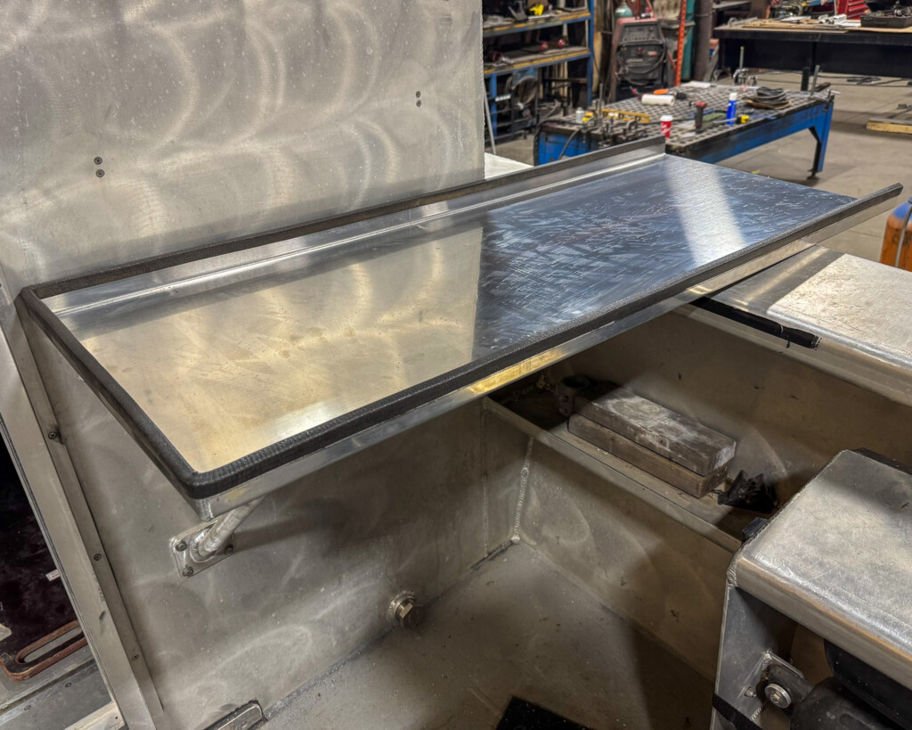 Custom fabricated metal shelf for Buffalo State College's All-Aluminum Boat!