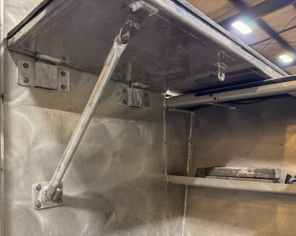 Custom fabricated metal shelf for Buffalo State College's All-Aluminum Boat!