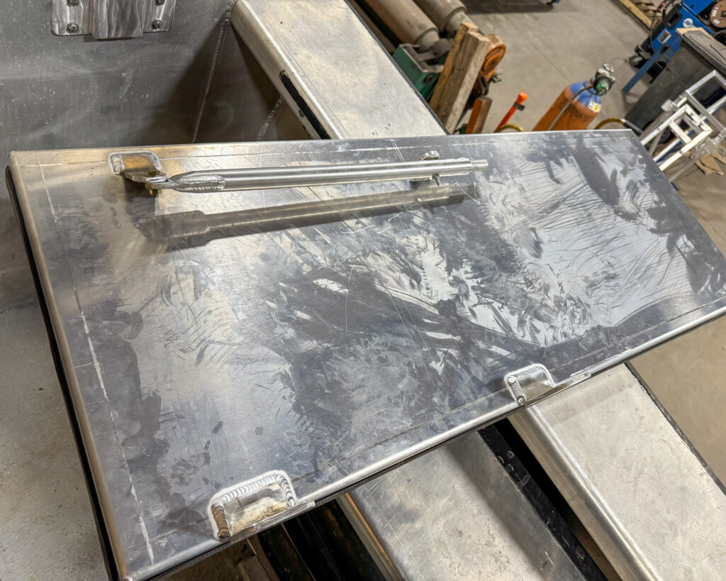 Custom fabricated metal shelf for Buffalo State College's All-Aluminum Boat!